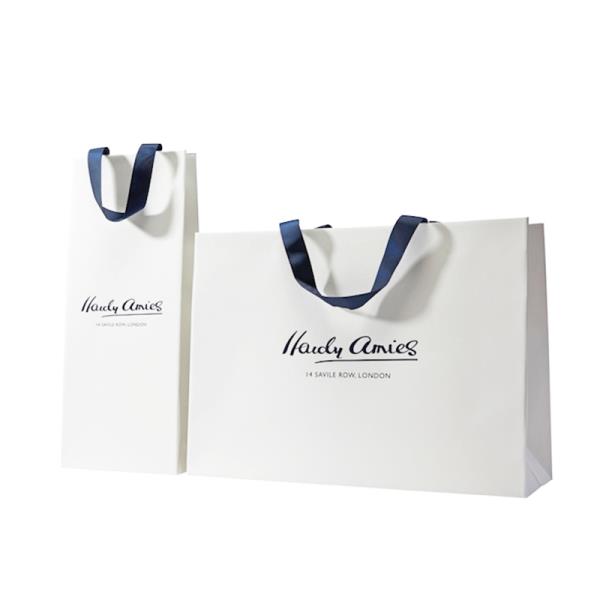 Sapphire Blue foil logo with ribbon handle paper bag